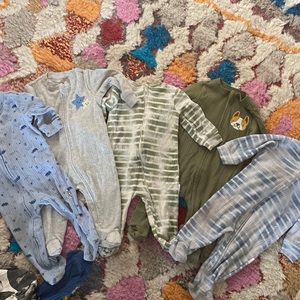 5 zip up footed onesies